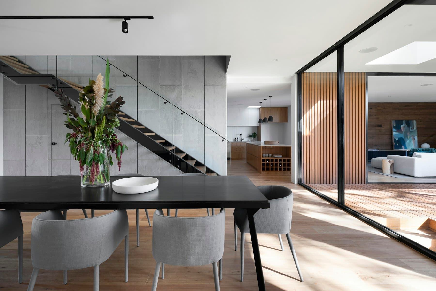 Light-filled holiday home with natural wood and thoughtful interiors